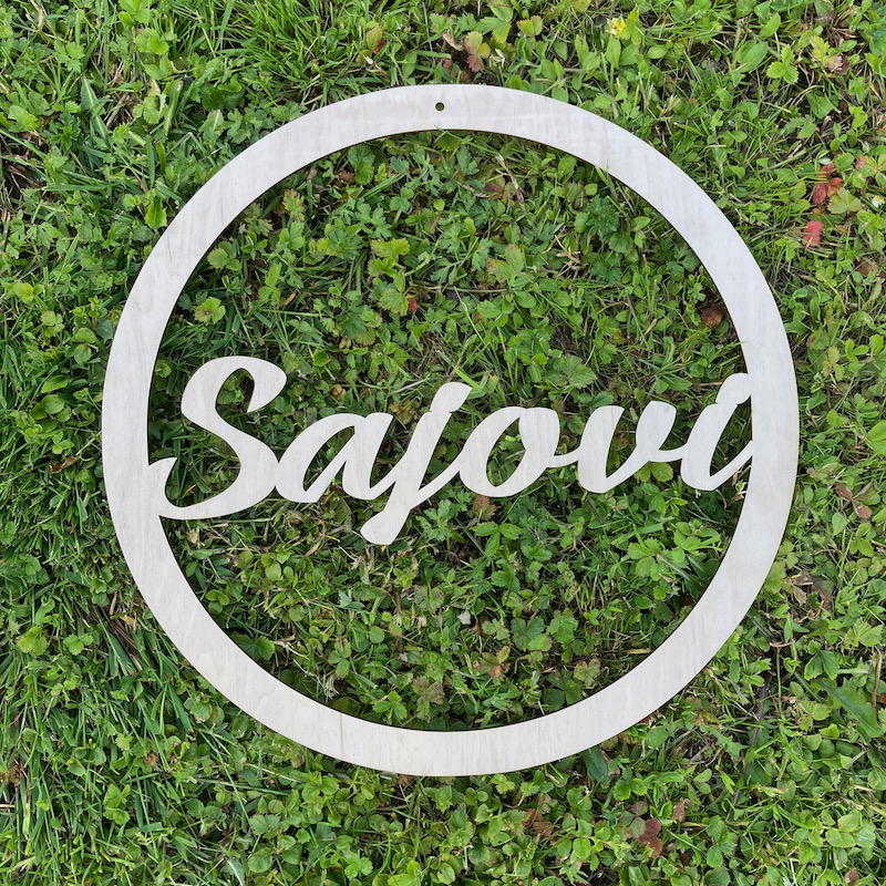 Dřevěné příjmení v kruhu