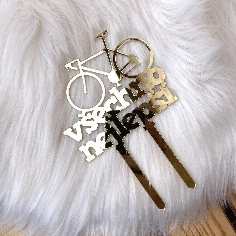 Zlatý zápich do dortu pro cyklistu