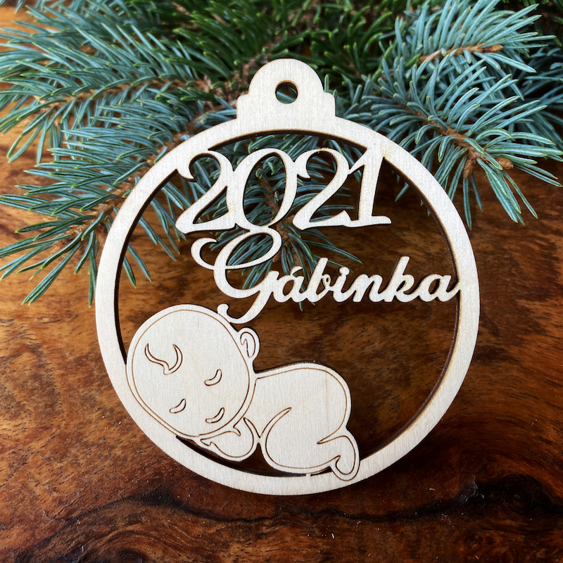 Dřevěná vánoční ozdoba s miminkem