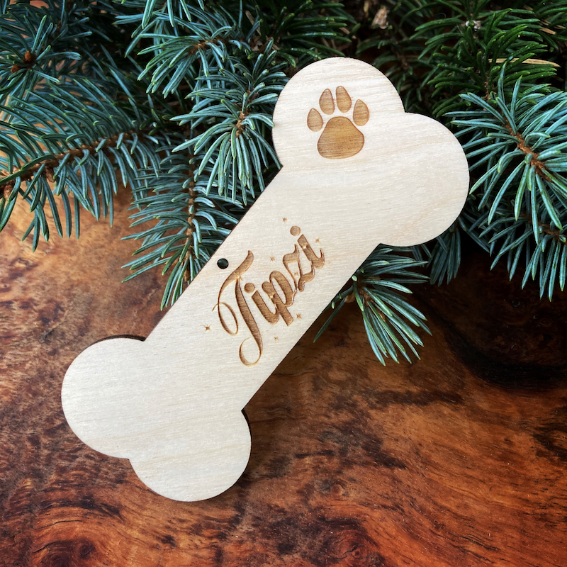 Dřevěná vánoční ozdoba - Kost se jménem